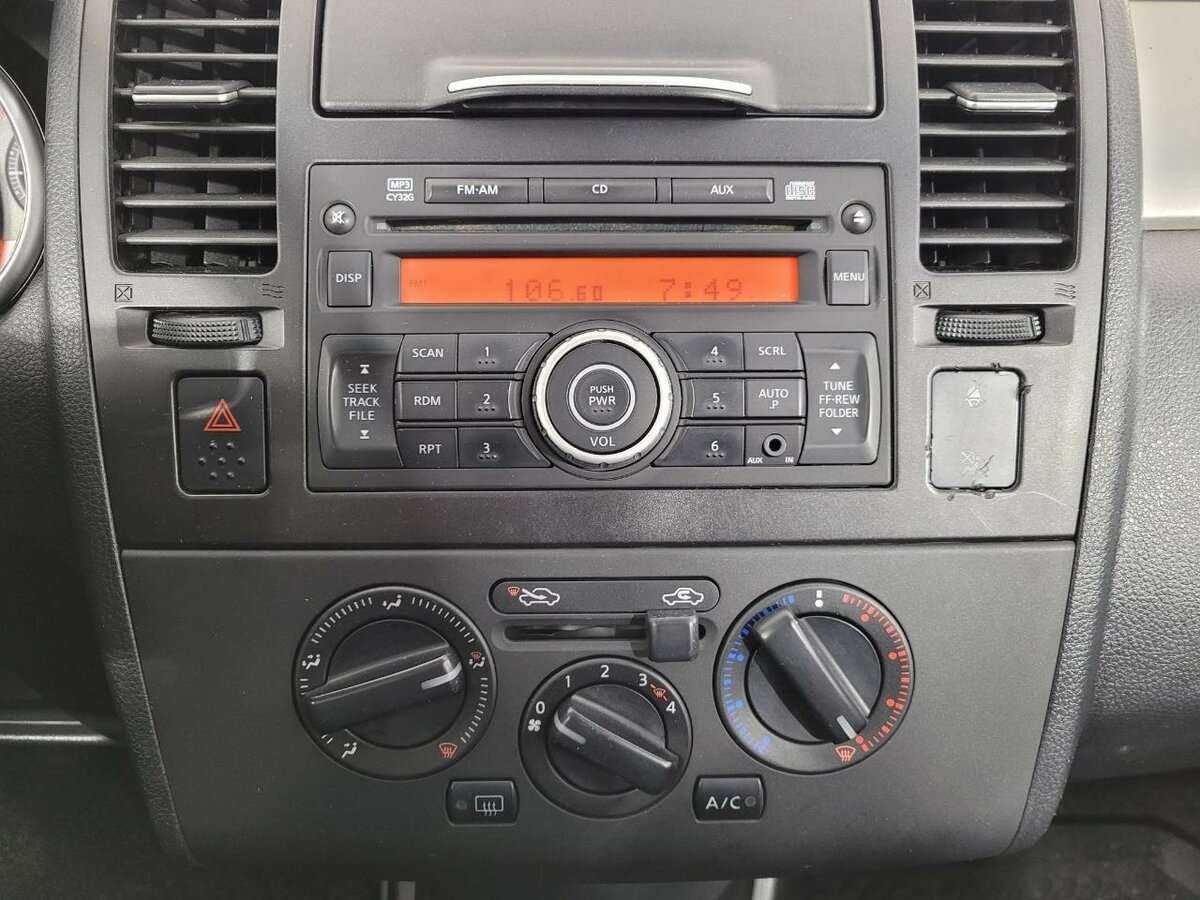 Nissan Tiida с пробегом — 2013 год. Фото: #11