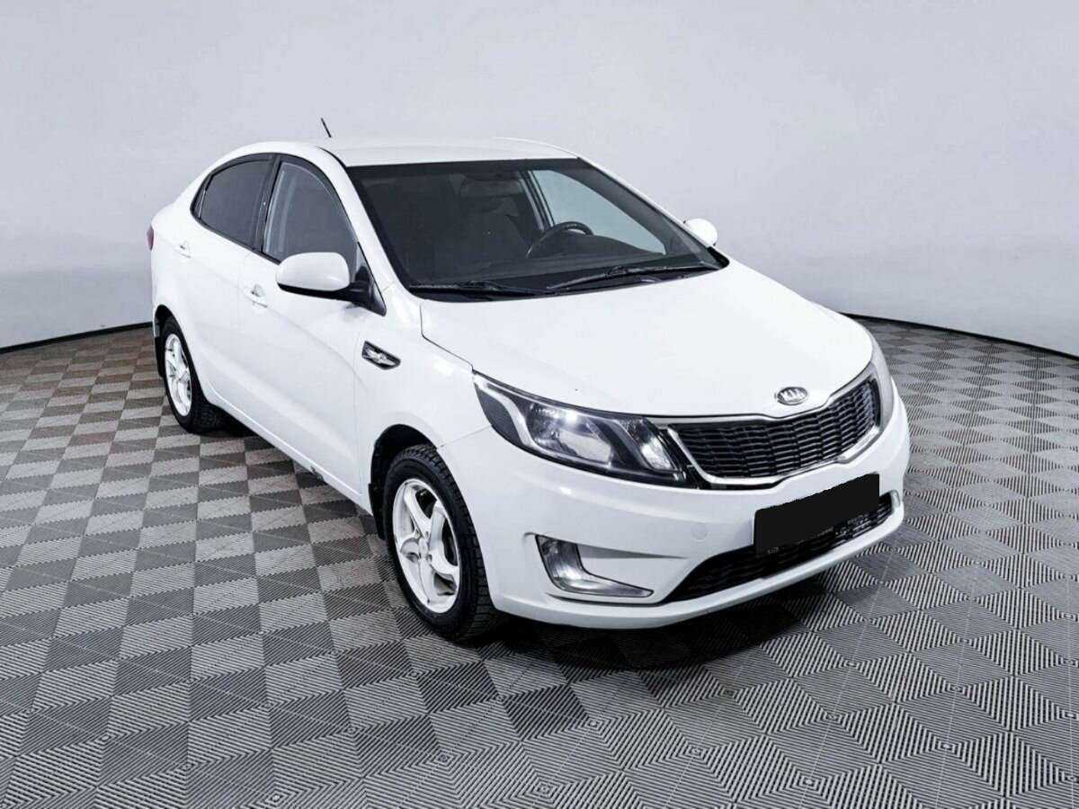 Kia Rio с пробегом — 2012 год. Фото: #2