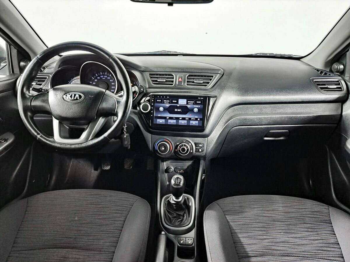 Kia Rio с пробегом — 2014 год. Фото: #11