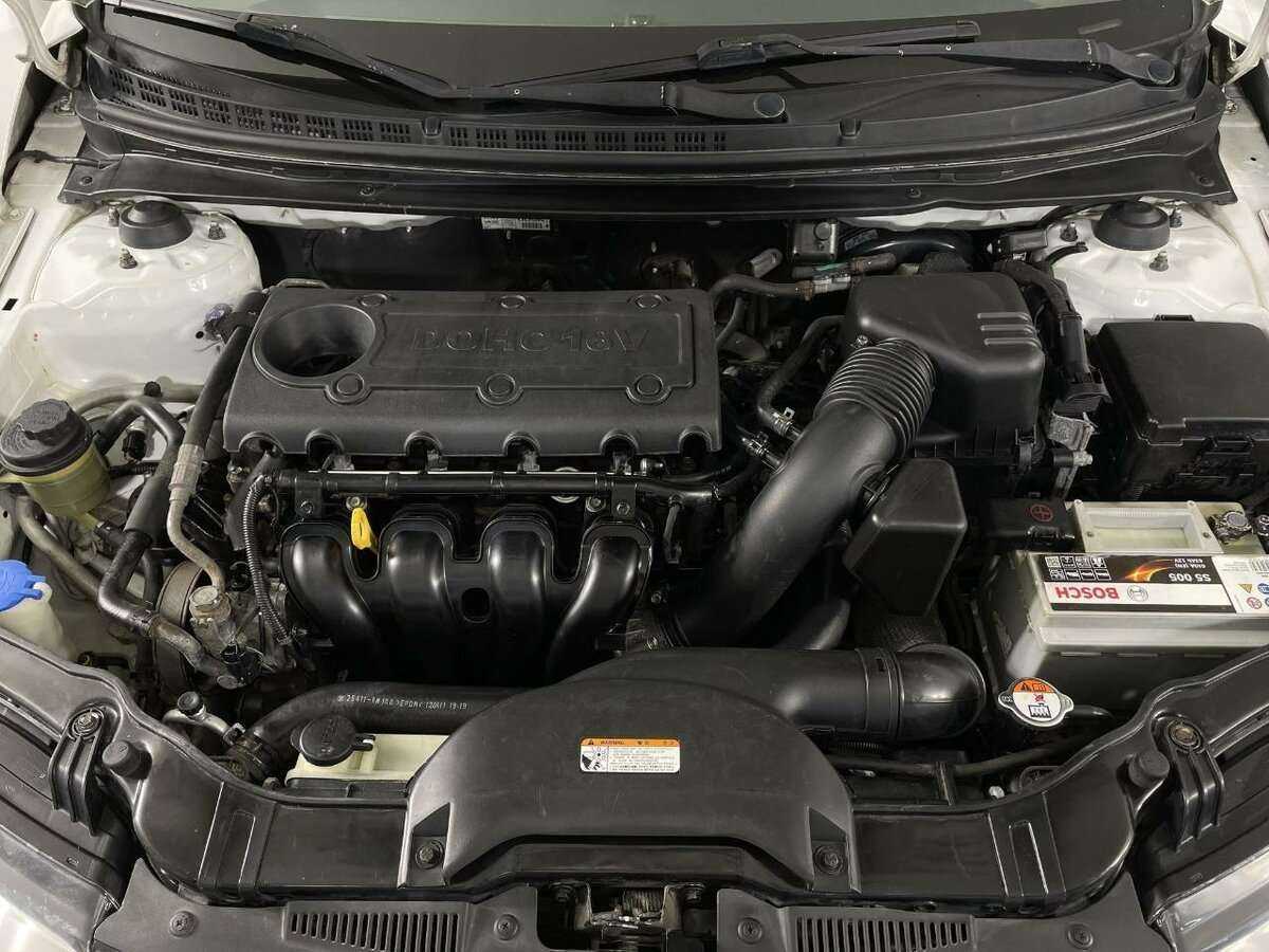 Kia Cerato с пробегом — 2012 год. Фото: #14