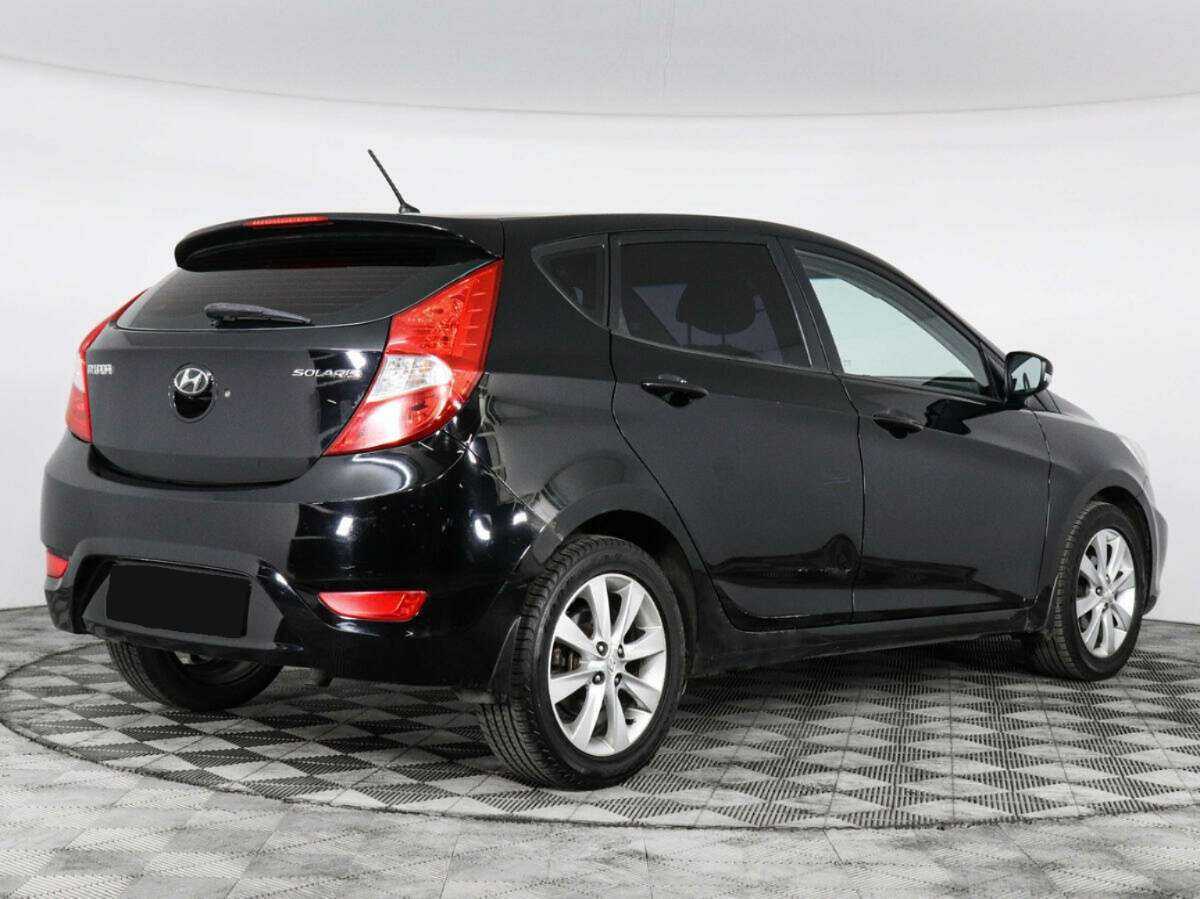 Hyundai Solaris с пробегом — 2012 год. Фото: #2