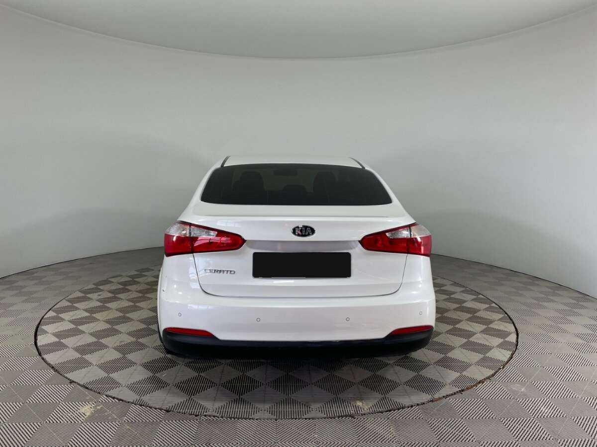 Kia Cerato с пробегом — 2014 год. Фото: #4