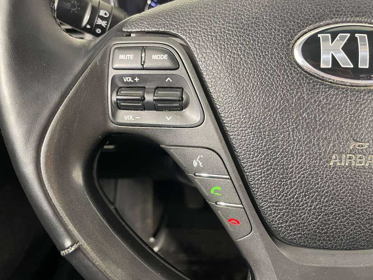 Kia Cerato с пробегом — 2015 год. Фото: #13