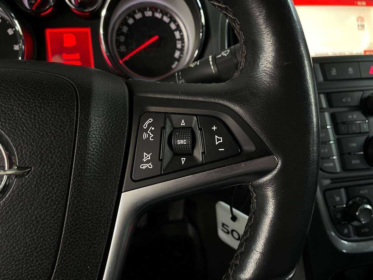 Opel Astra с пробегом — 2014 год. Фото: #11