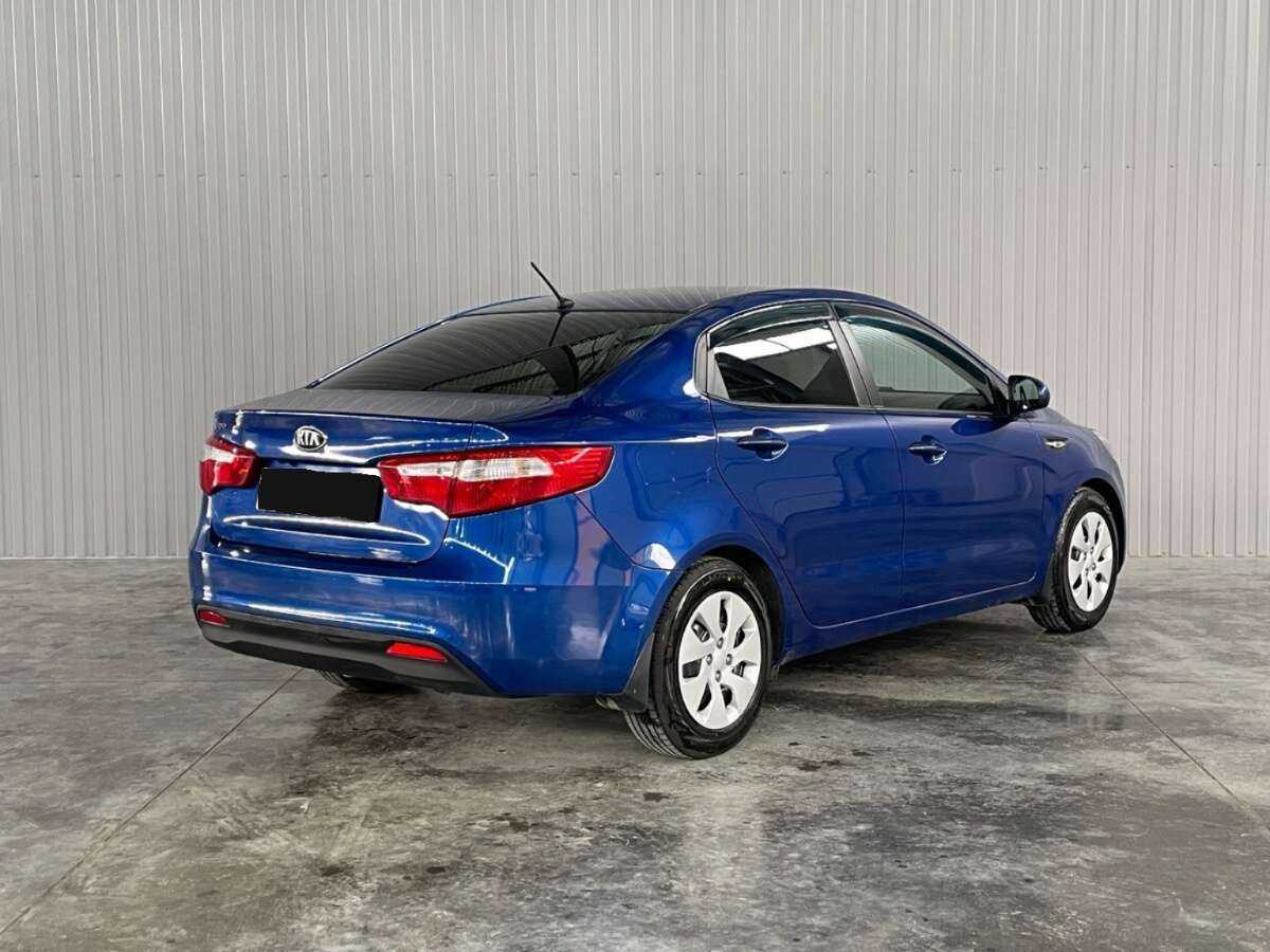 Kia Rio с пробегом — 2013 год. Фото: #4