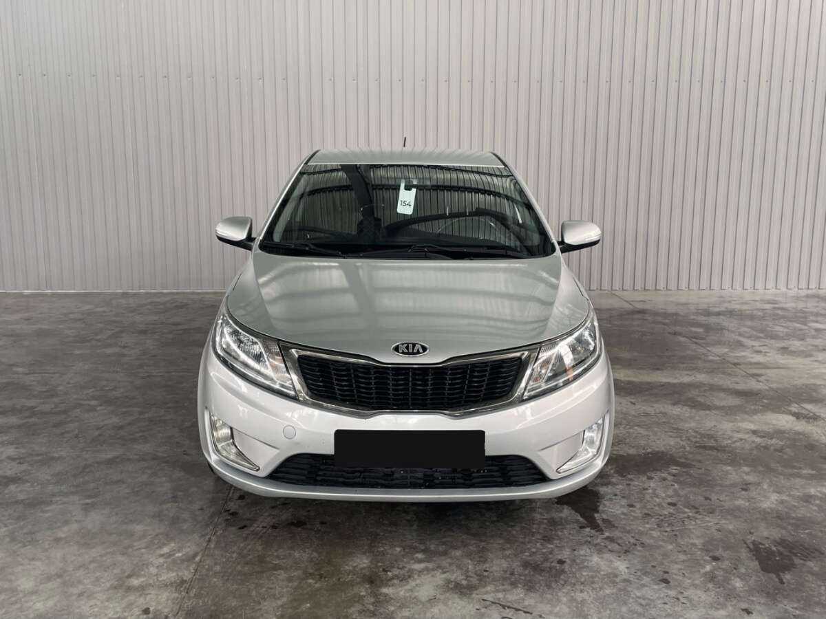 Kia Rio с пробегом — 2014 год. Фото: #1