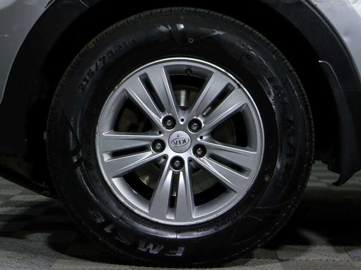 Kia Sportage с пробегом — 2012 год. Фото: #12