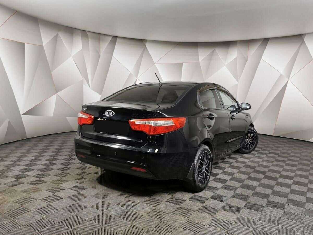 Kia Rio с пробегом — 2012 год. Фото: #1