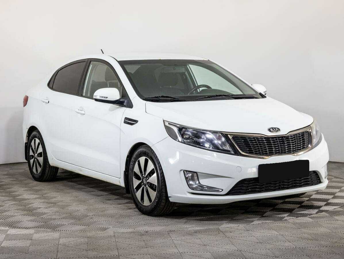 Kia Rio с пробегом — 2012 год. Фото: #2