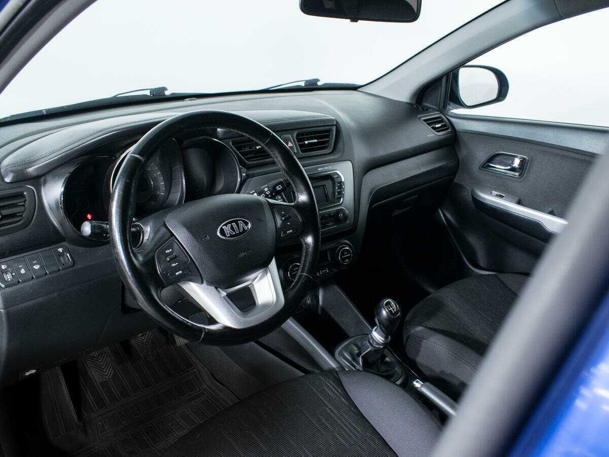 Kia Rio с пробегом — 2013 год. Фото: #12