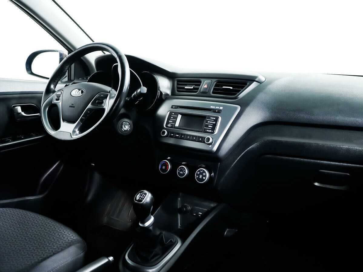 Kia Rio с пробегом — 2015 год. Фото: #6