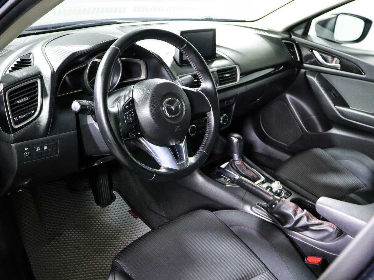 Mazda 3 с пробегом — 2014 год. Фото: #10