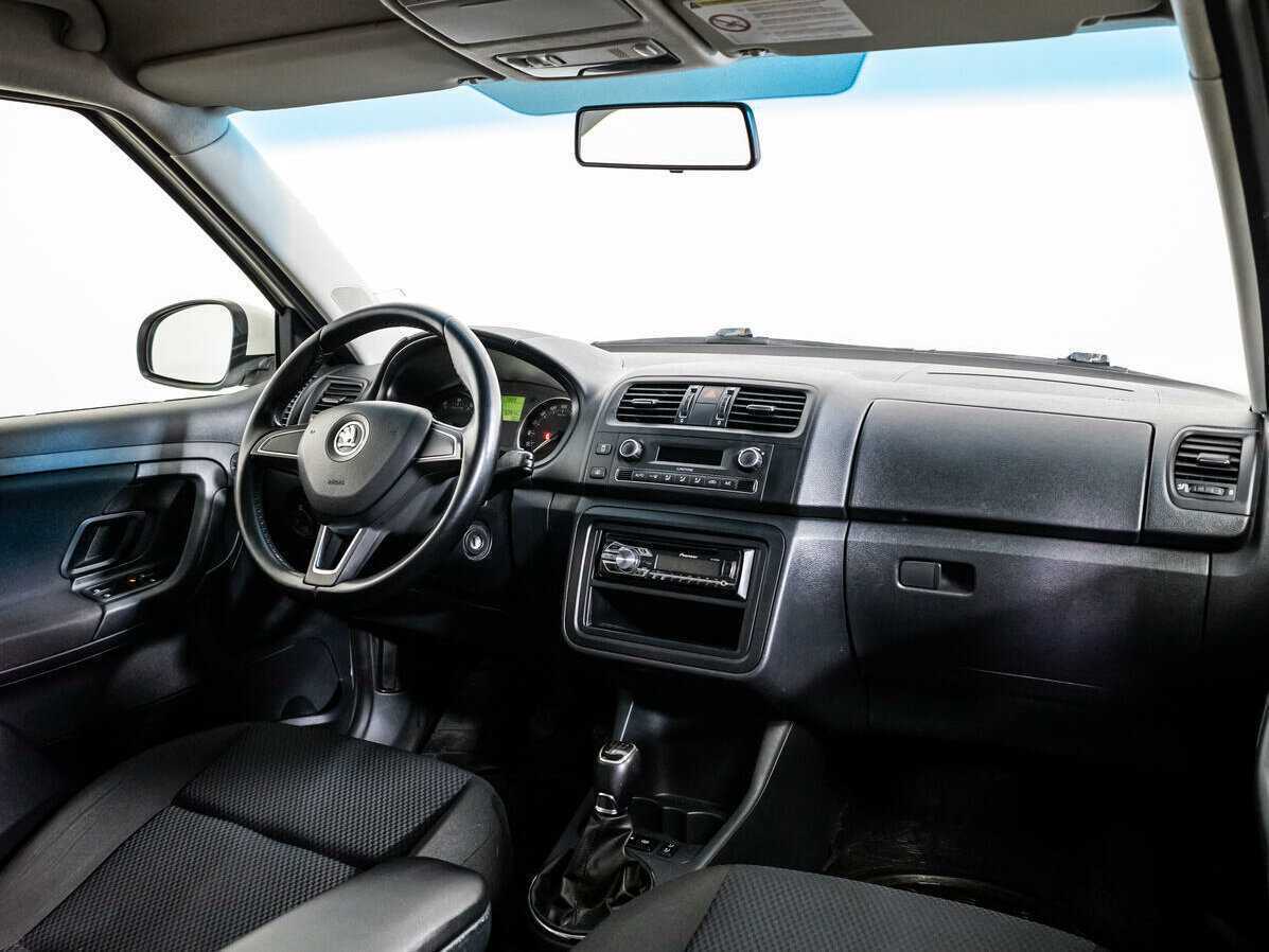 Skoda Fabia с пробегом — 2013 год. Фото: #8