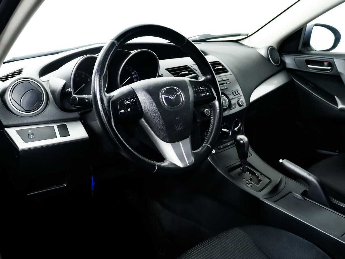 Mazda 3 с пробегом — 2012 год. Фото: #12