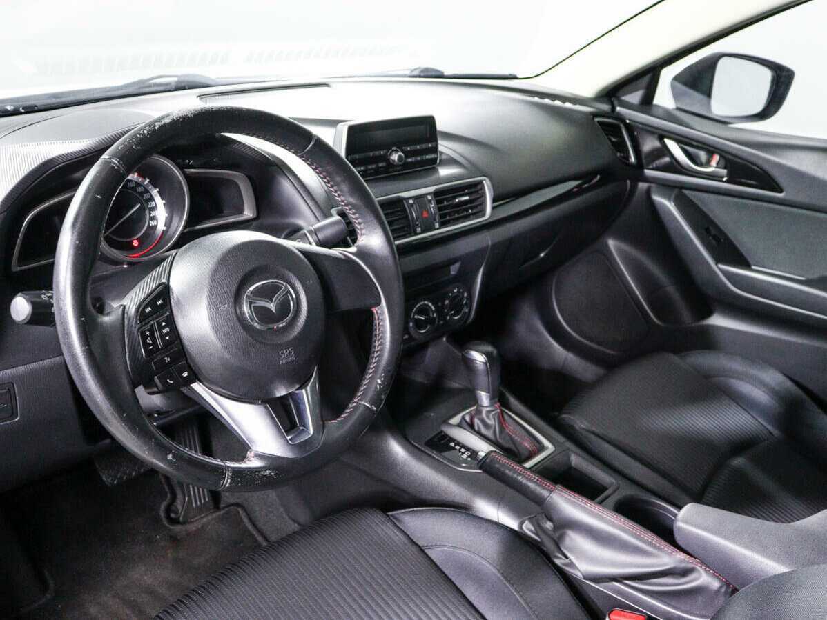 Mazda 3 с пробегом — 2014 год. Фото: #11