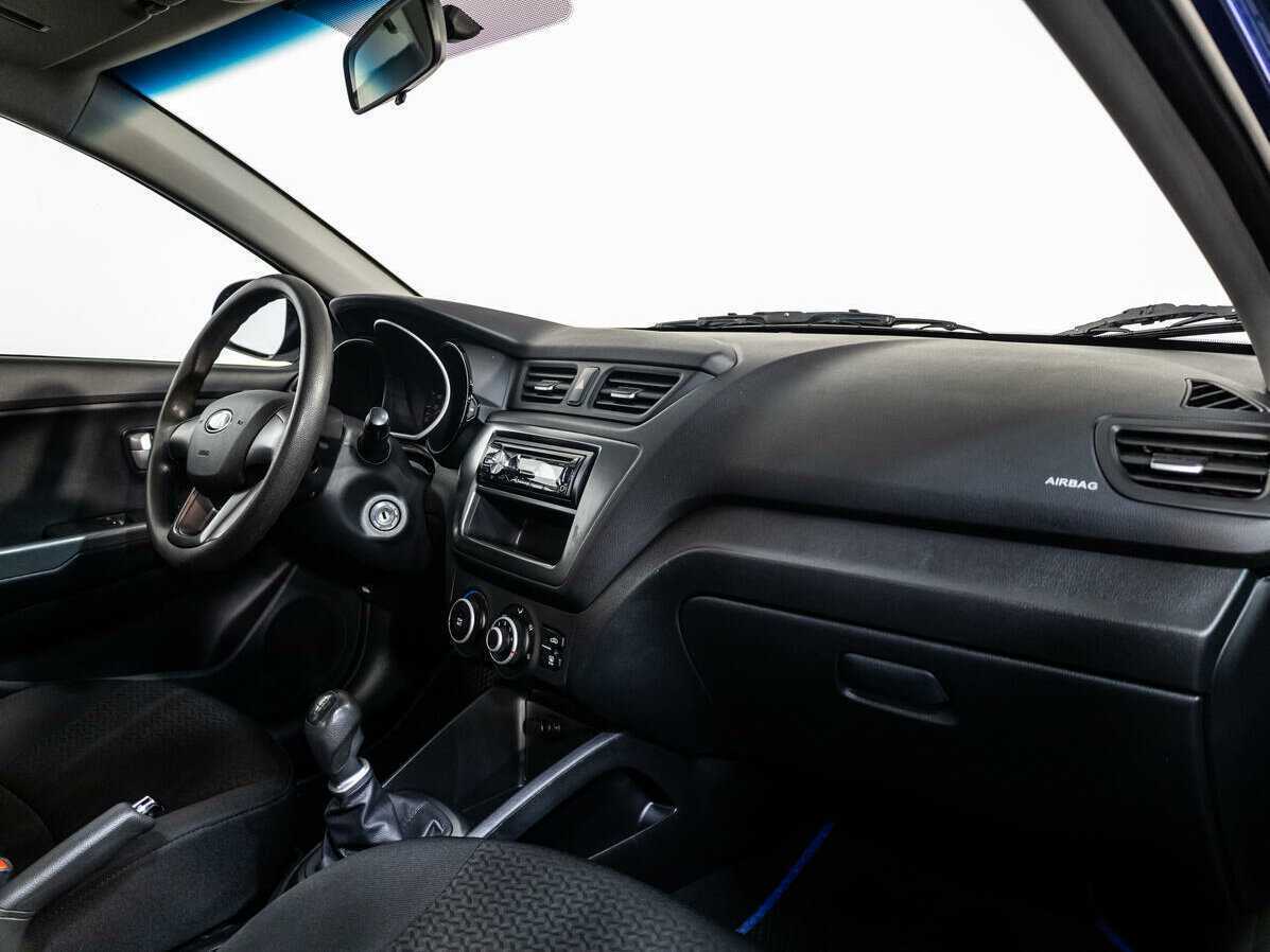 Kia Rio с пробегом — 2013 год. Фото: #7