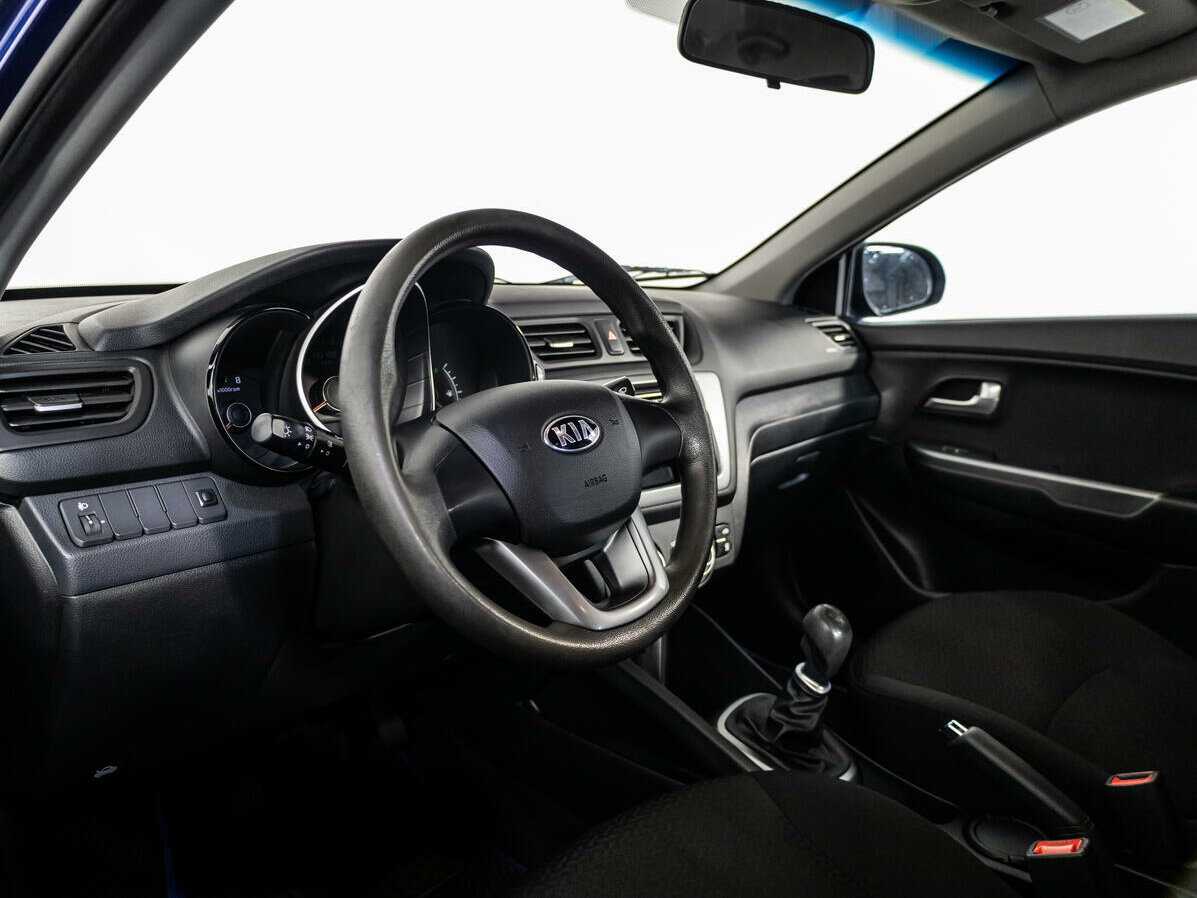 Kia Rio с пробегом — 2013 год. Фото: #9