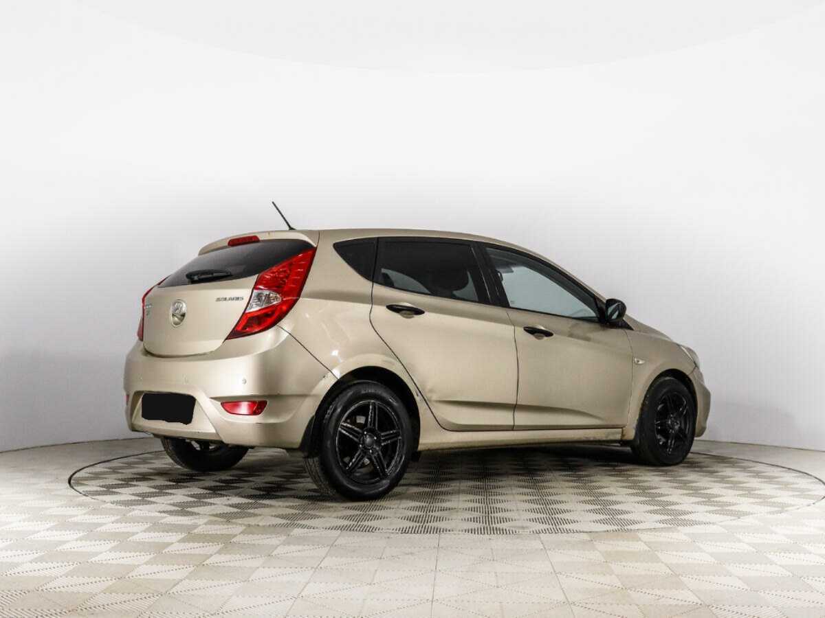 Hyundai Solaris с пробегом — 2013 год. Фото: #4