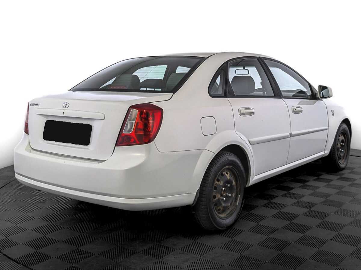 Daewoo Gentra с пробегом — 2014 год. Фото: #4