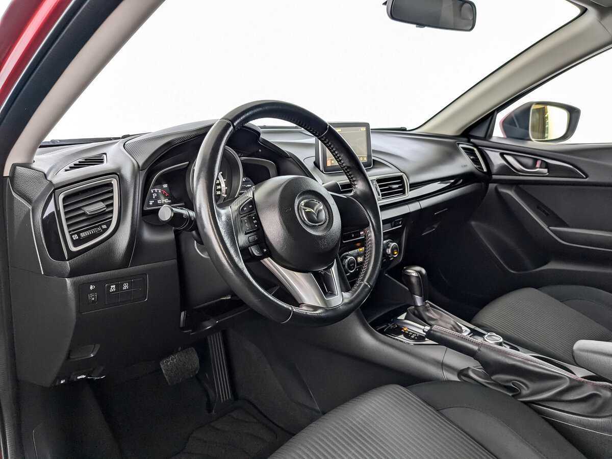 Mazda 3 с пробегом — 2014 год. Фото: #13