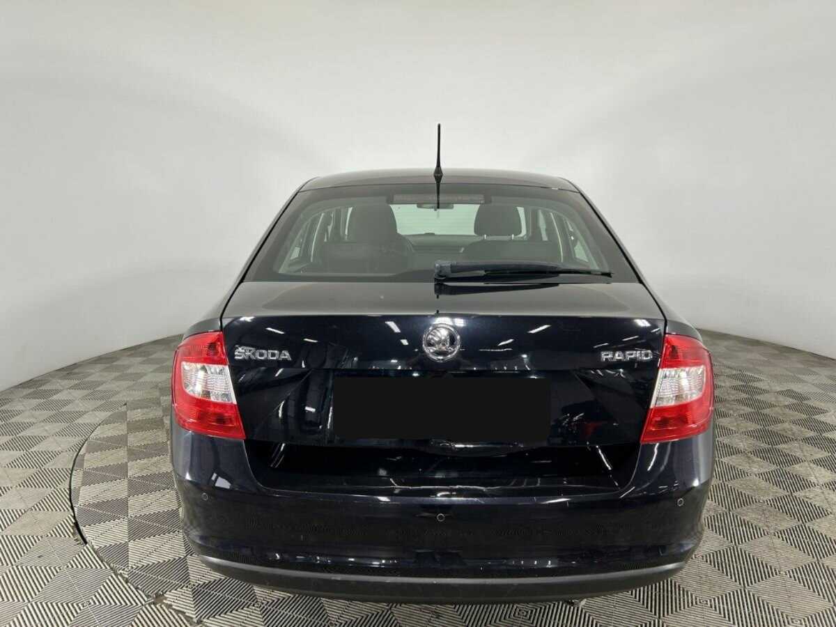 Skoda Rapid с пробегом — 2014 год. Фото: #2