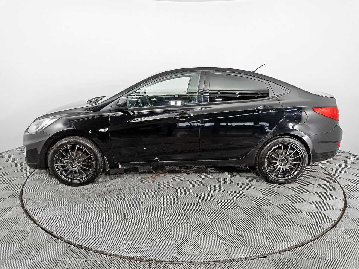 Hyundai Solaris с пробегом — 2013 год. Фото: #7