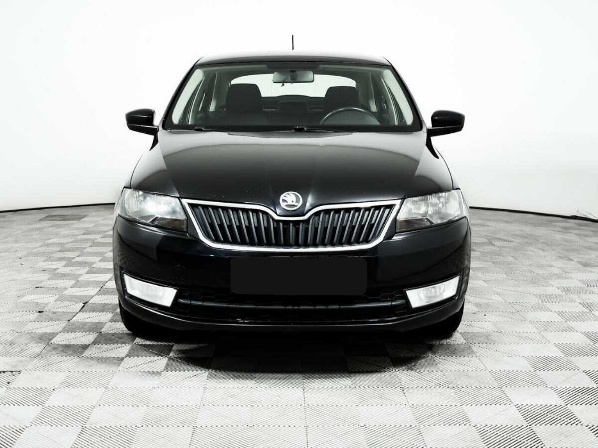 Skoda Rapid с пробегом — 2014 год. Фото: #1
