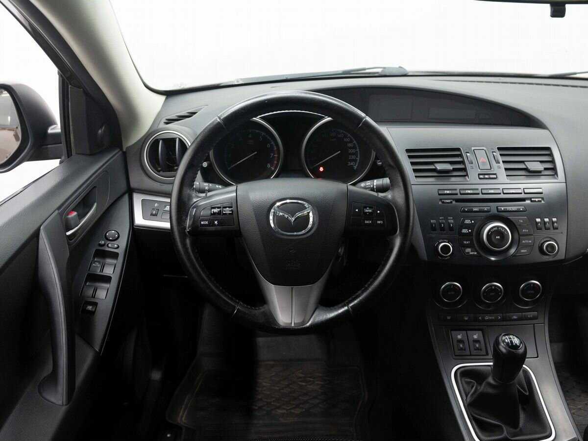 Mazda 3 с пробегом — 2012 год. Фото: #14