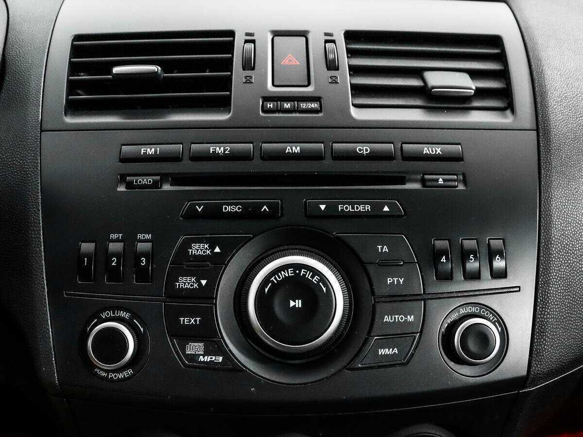 Mazda 3 с пробегом — 2012 год. Фото: #12