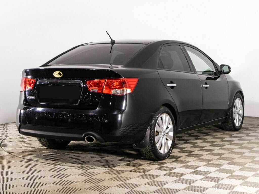 Kia Cerato с пробегом — 2012 год. Фото: #4