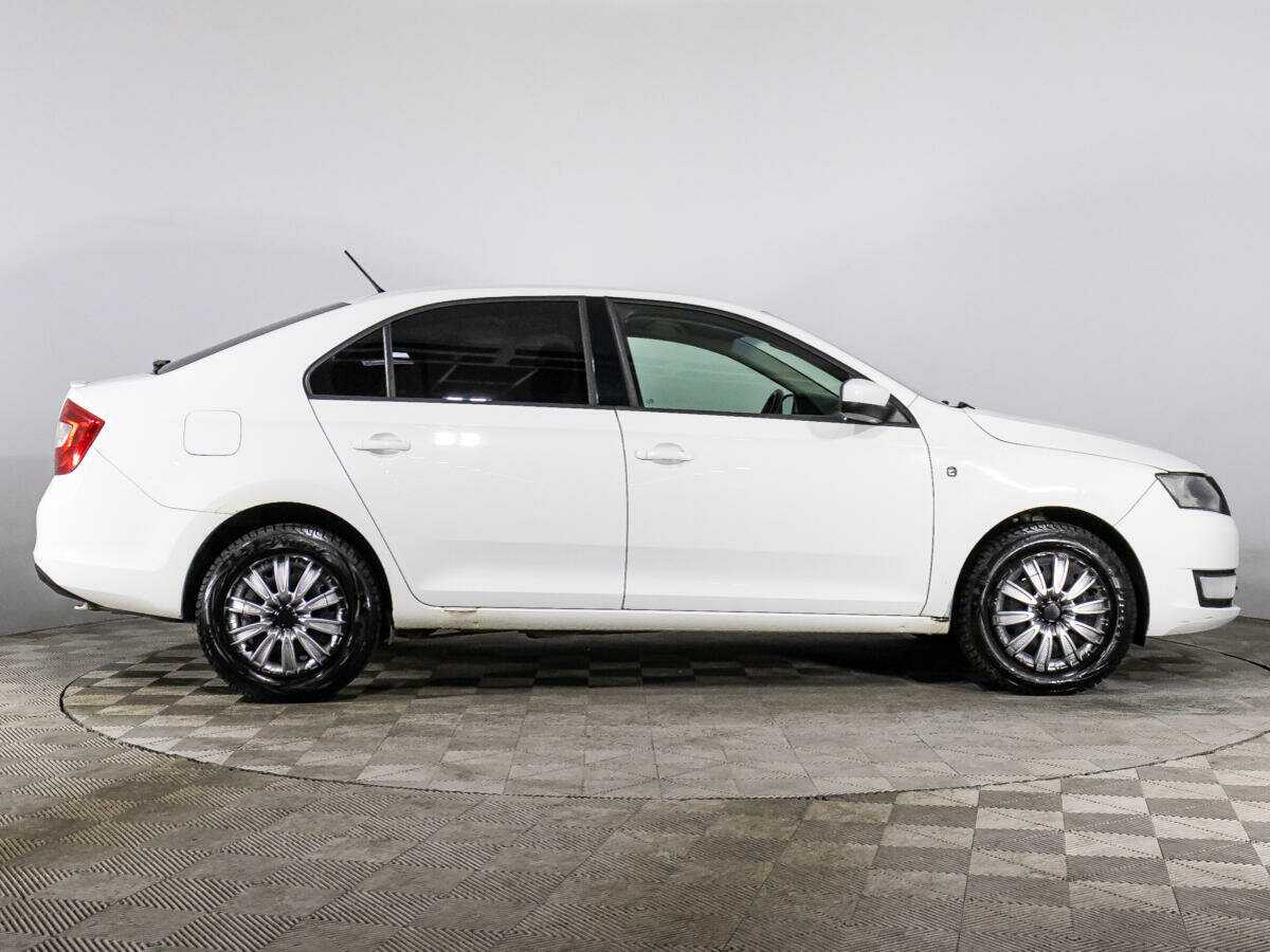 Skoda Rapid с пробегом — 2014 год. Фото: #1