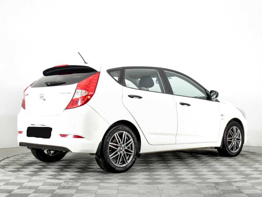 Hyundai Solaris с пробегом — 2014 год. Фото: #4