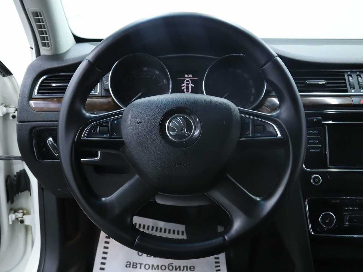 Skoda Superb с пробегом — 2013 год. Фото: #10