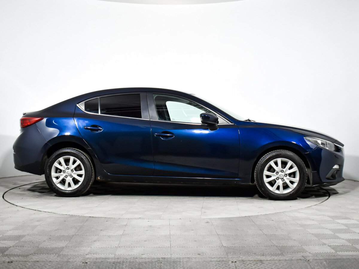 Mazda 3 с пробегом — 2014 год. Фото: #3