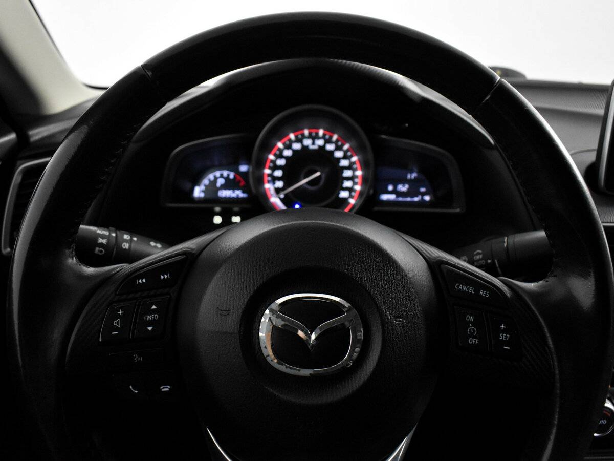 Mazda 3 с пробегом — 2014 год. Фото: #19