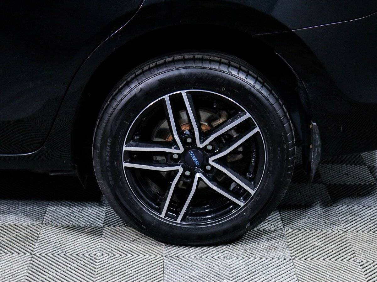 Toyota Corolla с пробегом — 2014 год. Фото: #11