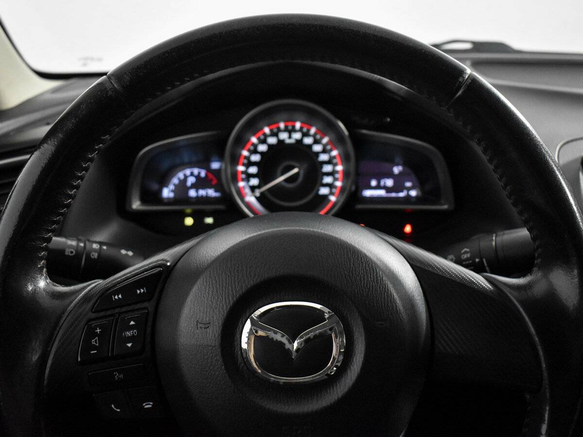 Mazda 3 с пробегом — 2014 год. Фото: #14