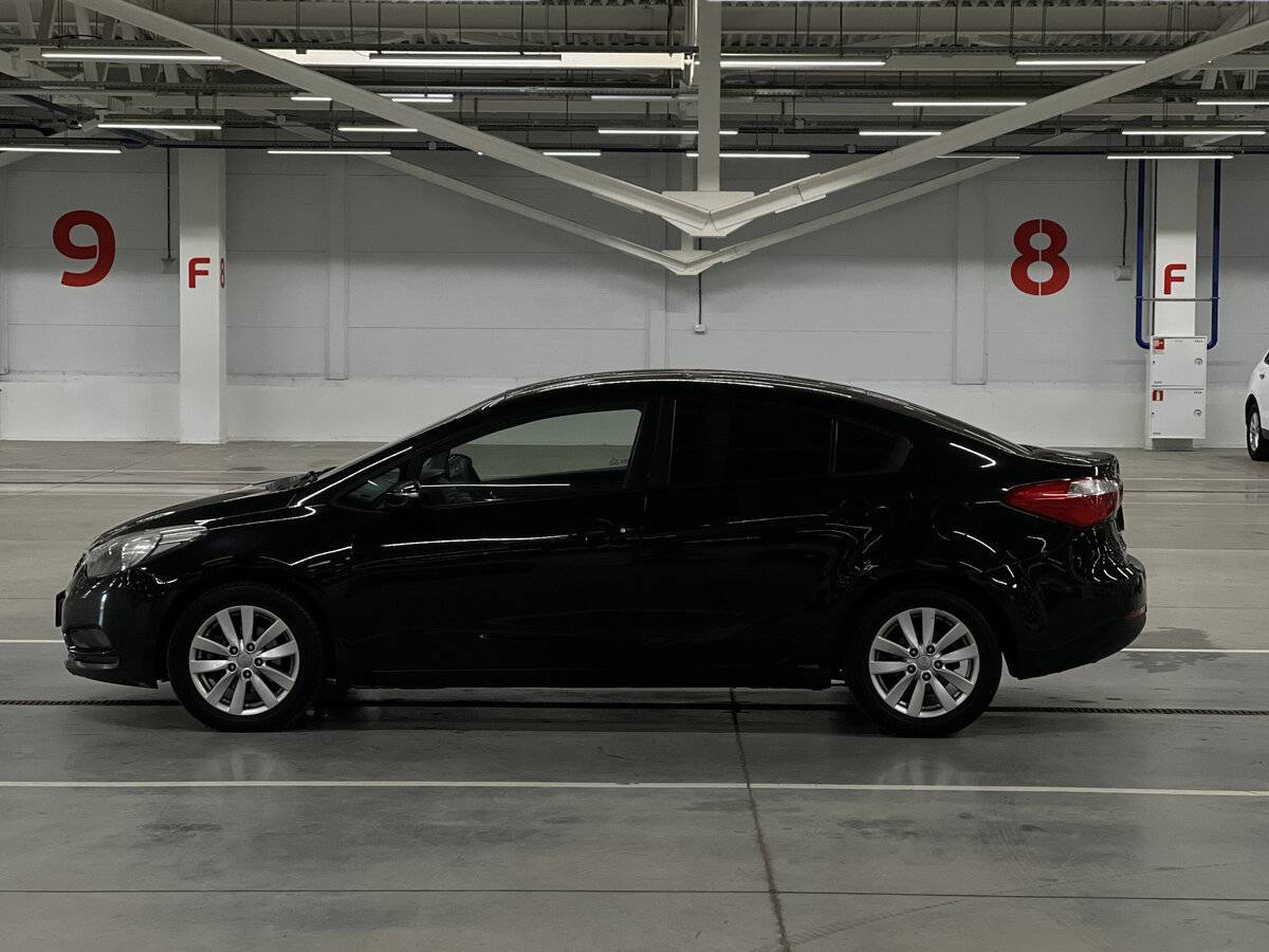 Kia Cerato с пробегом — 2014 год. Фото: #7