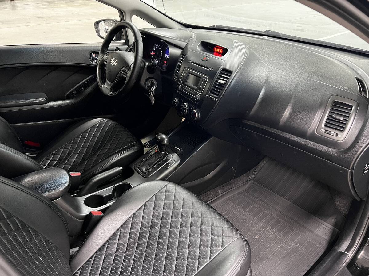 Kia Cerato с пробегом — 2014 год. Фото: #10