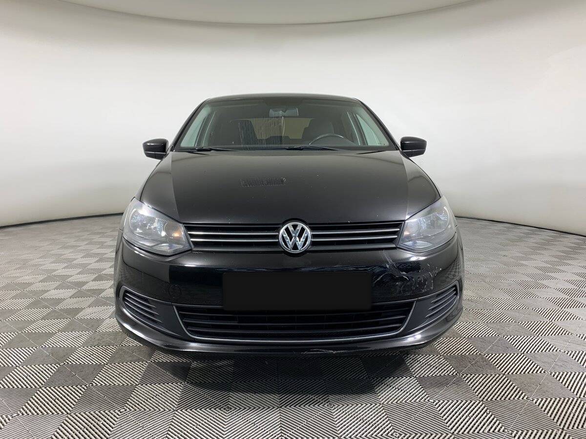 Volkswagen Polo с пробегом — 2013 год. Фото: #1