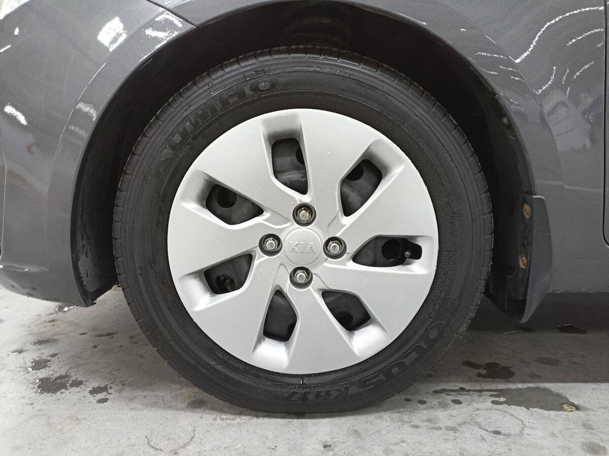 Kia Rio с пробегом — 2013 год. Фото: #17