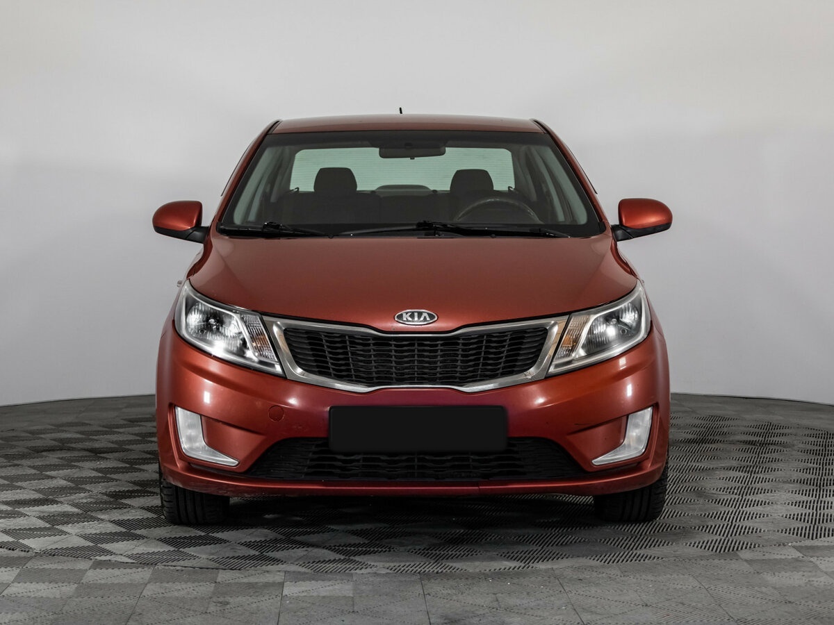 Kia Rio с пробегом — 2012 год. Фото: #1