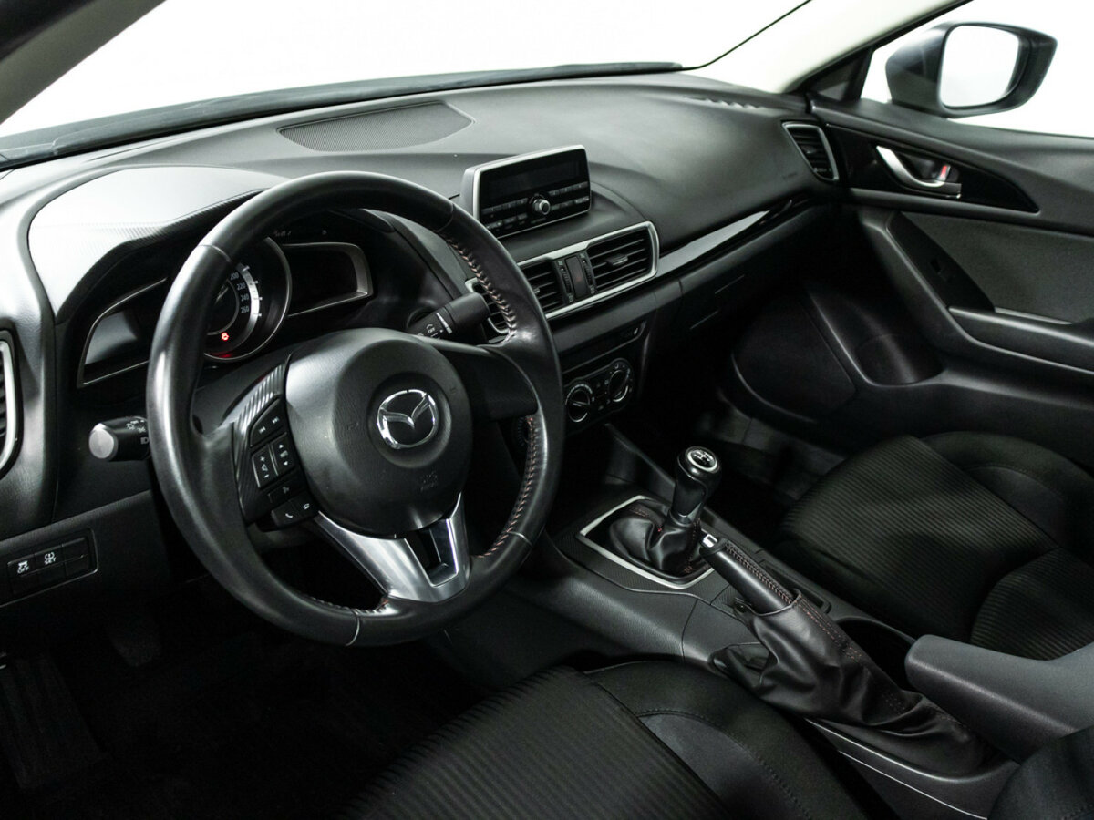 Mazda 3 с пробегом — 2014 год. Фото: #10